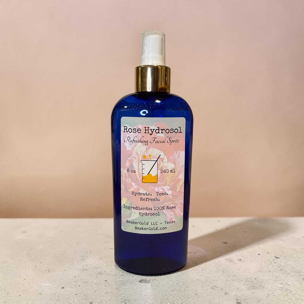 8 oz cobalt blue bottle of BeakerGold 100% Pure Rose Hydrosol Refreshing Facial Spritz